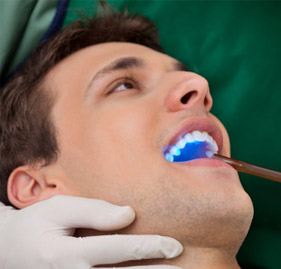 A man receiving dental bonding