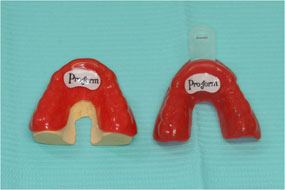 Two proform mouthguards placed on table