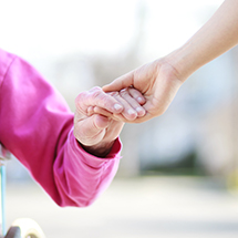 Person holding another’s hand