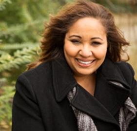 Woman with flawless smile after porcelain veneers