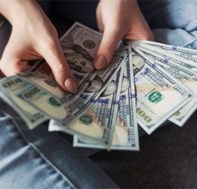 Woman counting cash