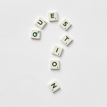 Question mark made from Scrabble tiles